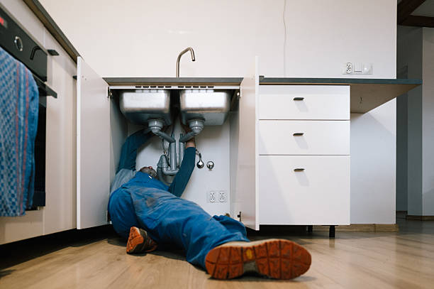 Professional Emergency Plumber technician working in Clinton, IN